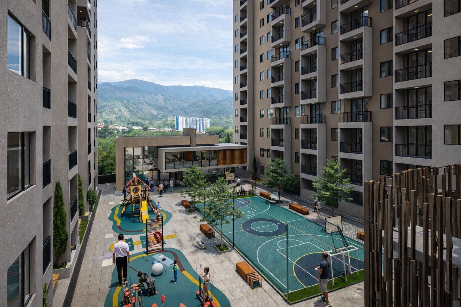 Zona de juegos infantiles y cancha múltiple, con vista a la montaña.